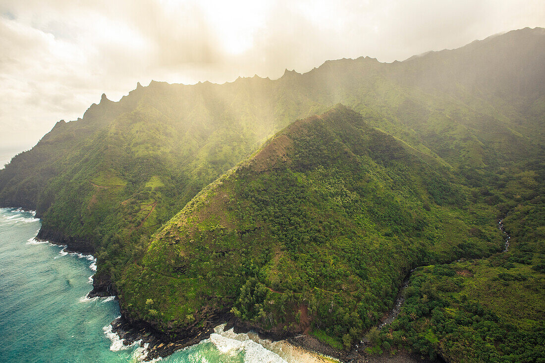 Ocean Mist And Clouds Sit In The Mountains Of Kauai, Hawaii