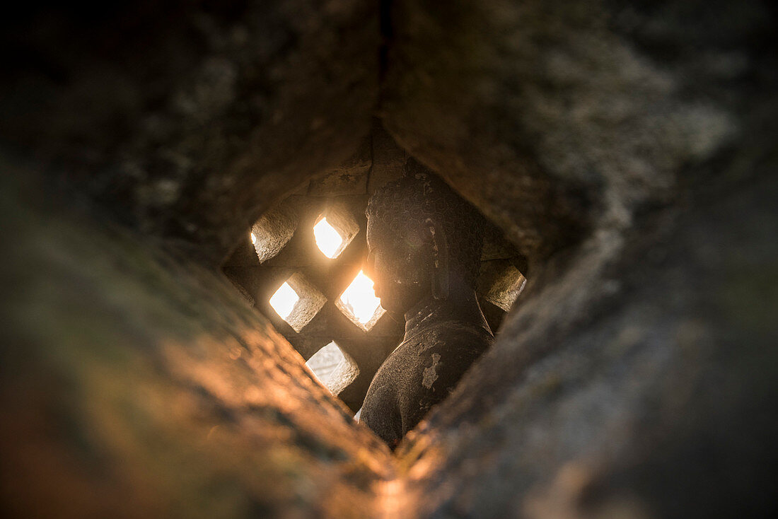 View Of The Buddha Statue At The Borobudur Temple In Java, Indonesia