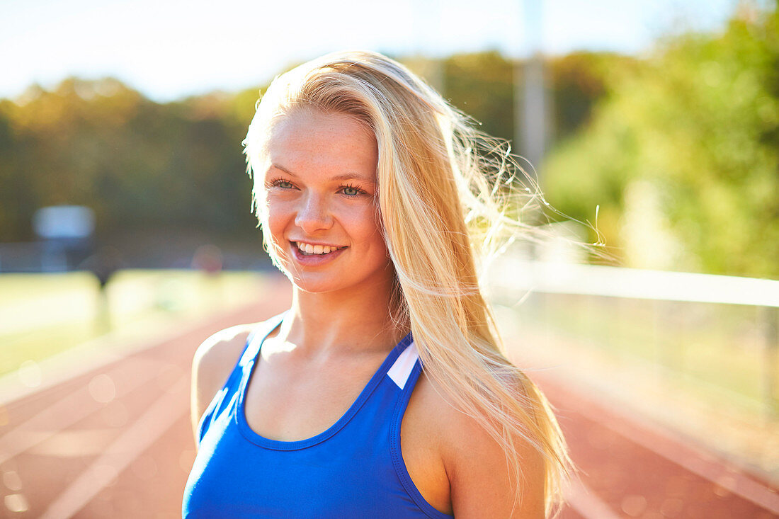 Portrait Of An Young Smiling Female Athlete