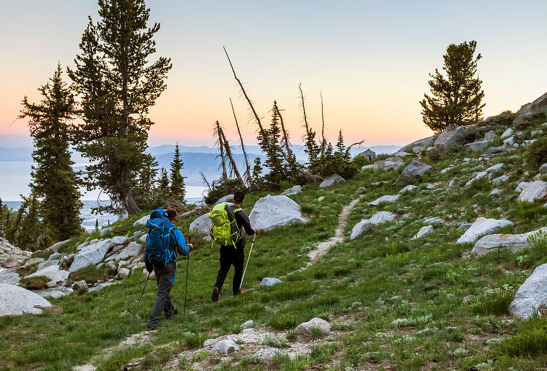 Two Men Hiking Down At Utah's Lone Peak Located In The Wasatch Mountains