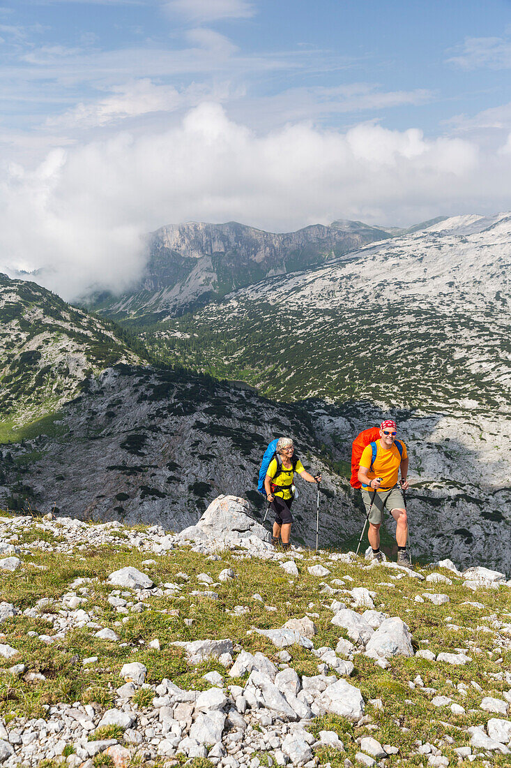 A woman and a man hiking, Totes Gebirge, Bad Aussee, Styria, Austria, Europe