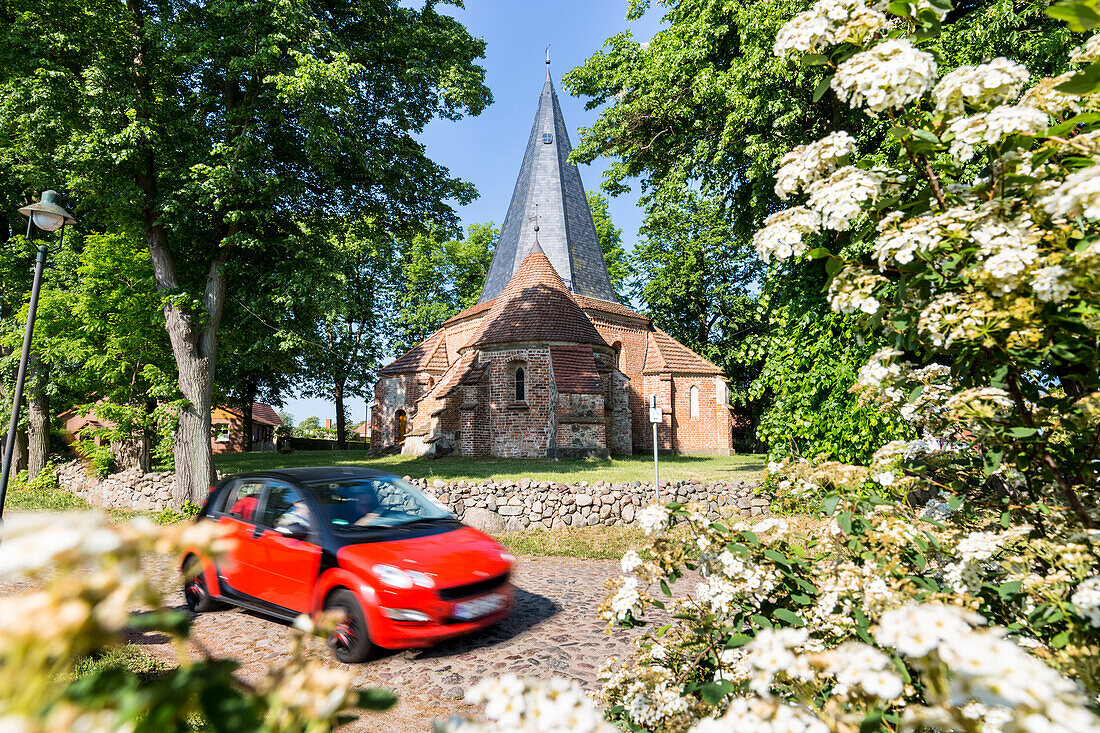 church of Ludorf, red car, Mecklenburg lakes, Mecklenburg lake district, Mecklenburg-West Pomerania, Germany, Europe