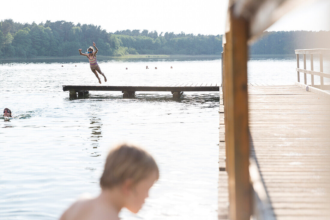 public bathing beach, lido, landing stage, swimming, summer, women, girls, bathing, big white lake, Wesenberg, Mecklenburg lakes, Mecklenburg lake district, Mecklenburg-West Pomerania, Germany, Europe