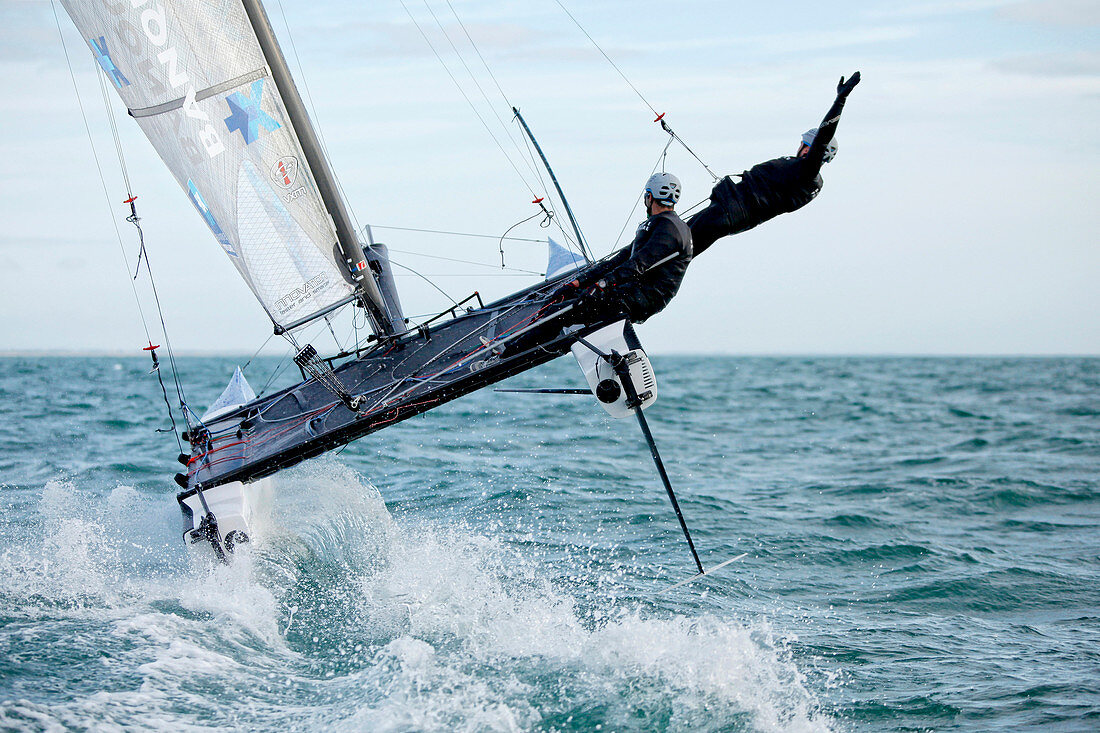 Armel Le ClÃ©ac'h and Kevin Escoffier from the Banque Populaire Sailing Team and the Flying Phantom. The Flying Phantom is a new generation of foiling catamarans design by Martin Fisher.