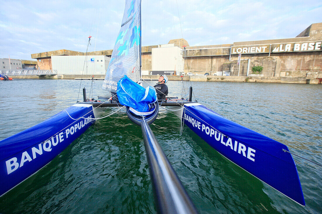 Armel Le ClÃ©ac'h and Kevin Escoffier from the Banque Populaire Sailing Team and the Flying Phantom. The Flying Phantom is a new generation of foiling catamarans design by Martin Fisher.