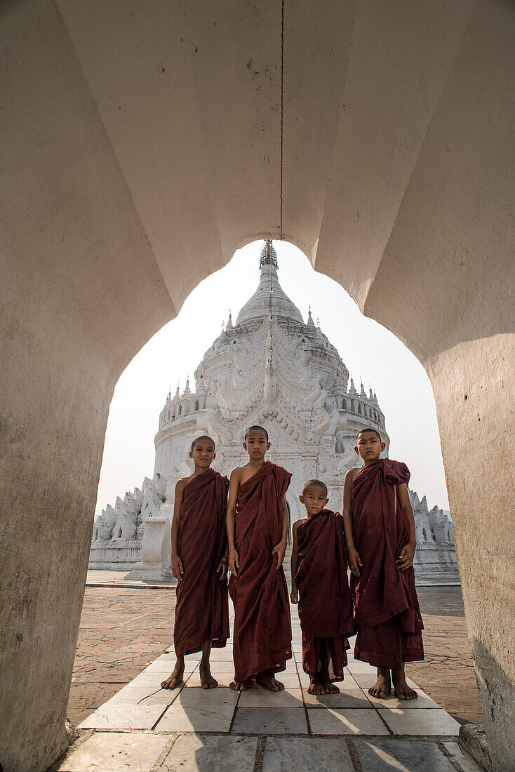 Group Of Buddhist Monks Standing At Hsinbyume Pagoda