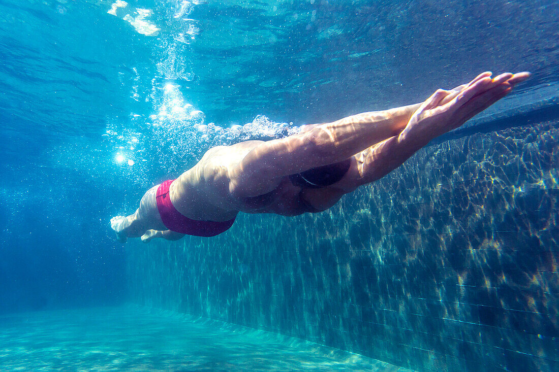 Athlete Man Swimming In Pool