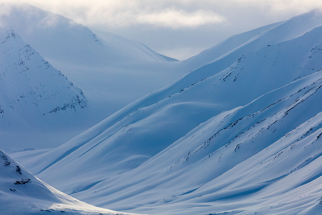 Scenic View Of Snowy Mountains In Spitsbergen, Svalbard