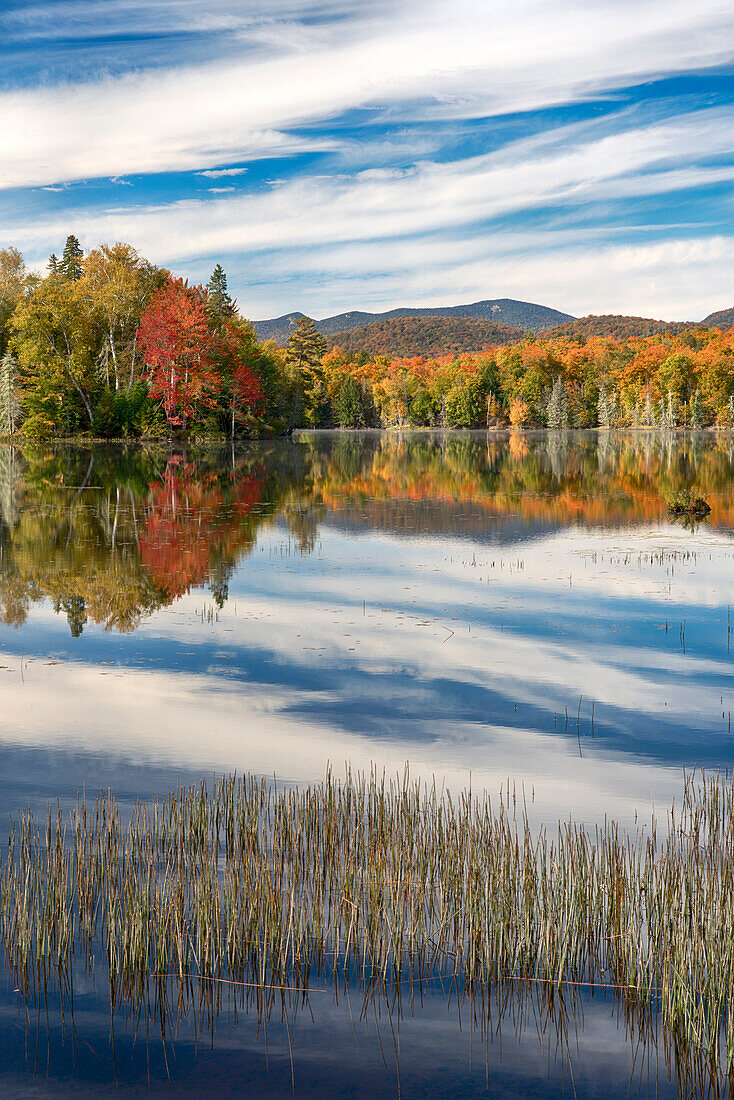 Reflection Of Autumn Trees In Lake Abanakee, New York, Usa