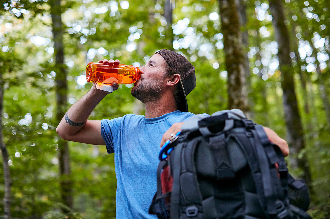A Man Drinking Water While Hiking Along The Appalachian Trail