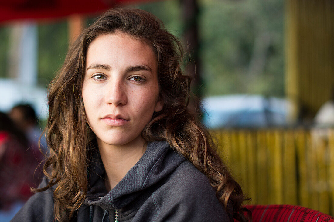 Portrait Of Young Attractive Female In A Restaurant At The Edges Of Lake Atitlan