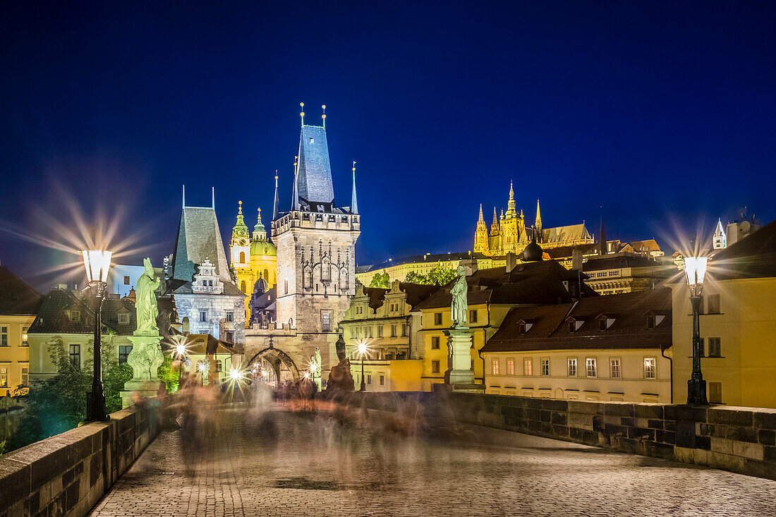 Charles Bridge And Buildings In Mala Strana At Night