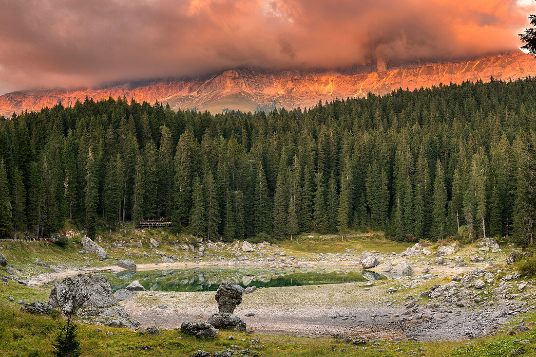 Europe, Italy, Trentino South Tyrol, Bolzano province, sunset at carezza lake