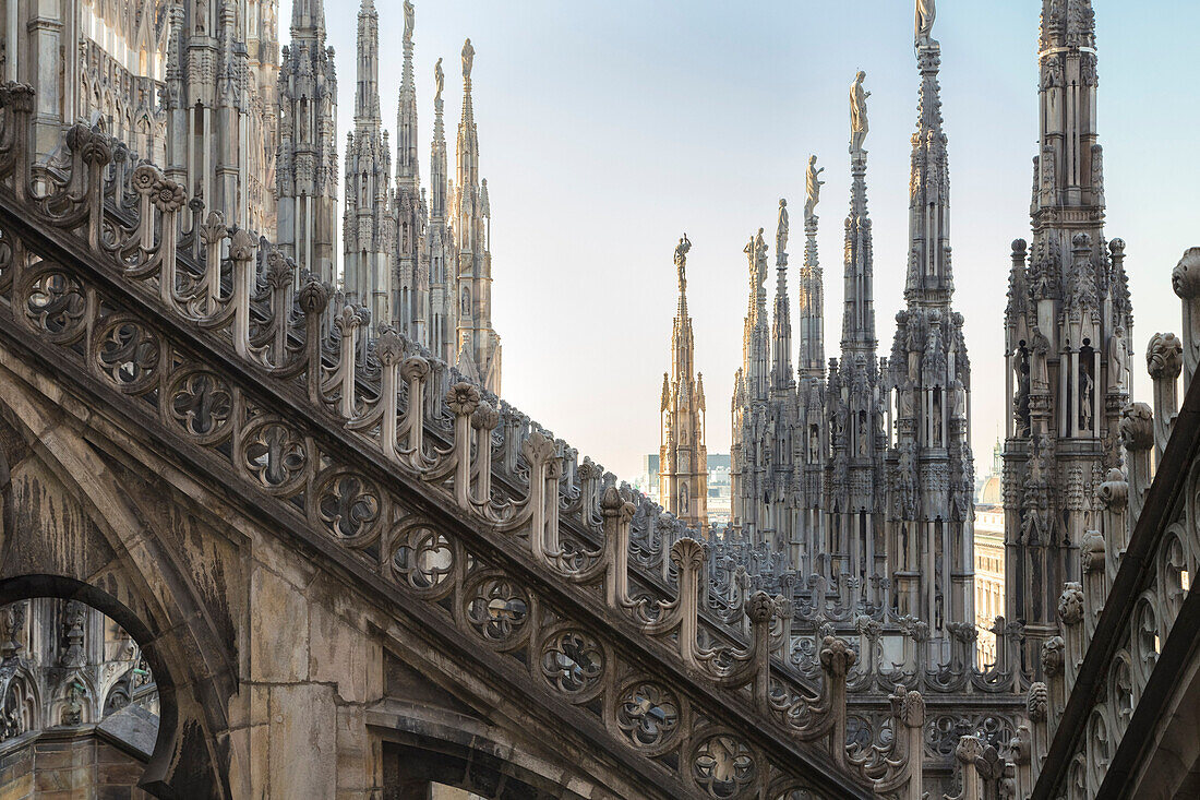 On the rooftop of the Duomo di Milano, among the white marble spiers, Milano, Lombardy, Italy