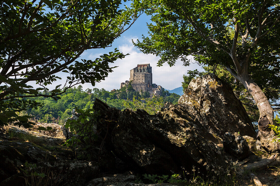 View of the monastery called Sacra di San Michele, symbol of Piedmont region, located on the mount Pirchiriano, Sant'Ambrogio di Torino, Val di Susa, Torino district, Piedmont, Italy