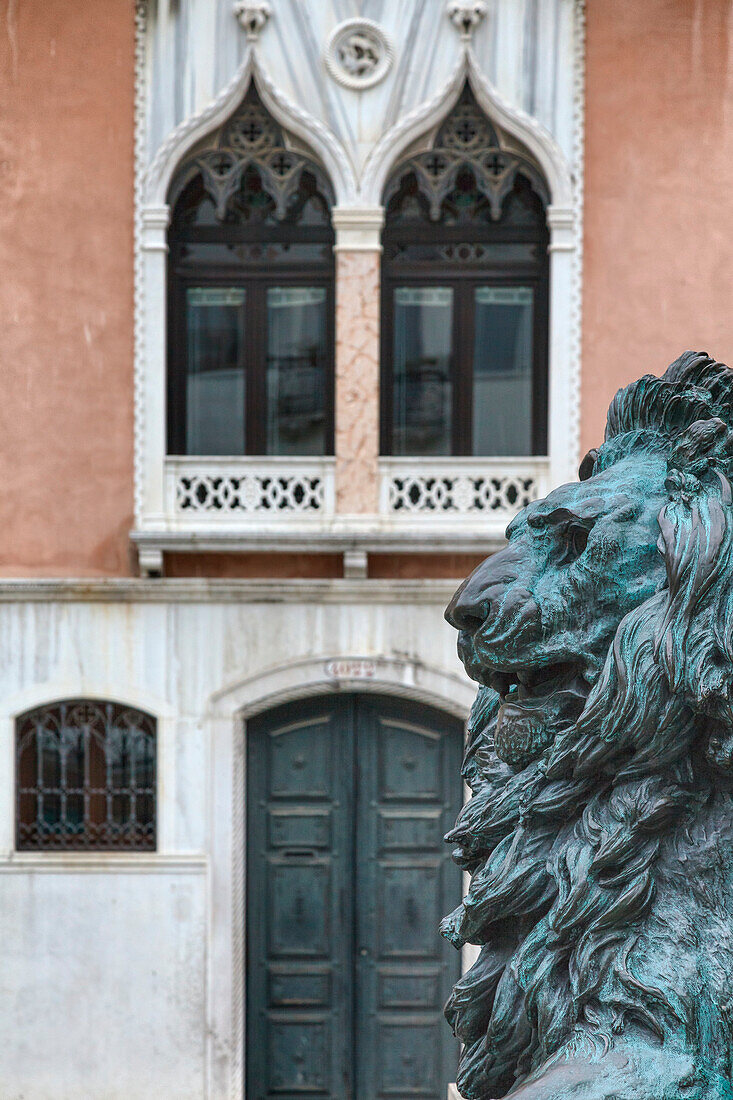 Europe, Italy, Veneto, Venice,  Detail of a St,  Mark lion on the bronze statue of the venetian patriot Daniel Manin