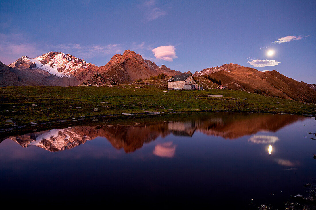 Valtellina, Disgrazia mountain reflect at Scermendone lake, Lombardy, Italy