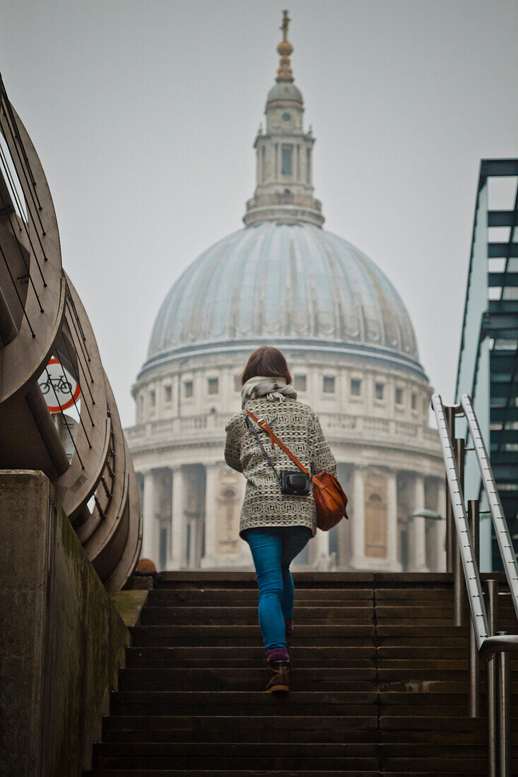 A Tourist Walks Up Towards Saint Paul's Cathedral, London, England