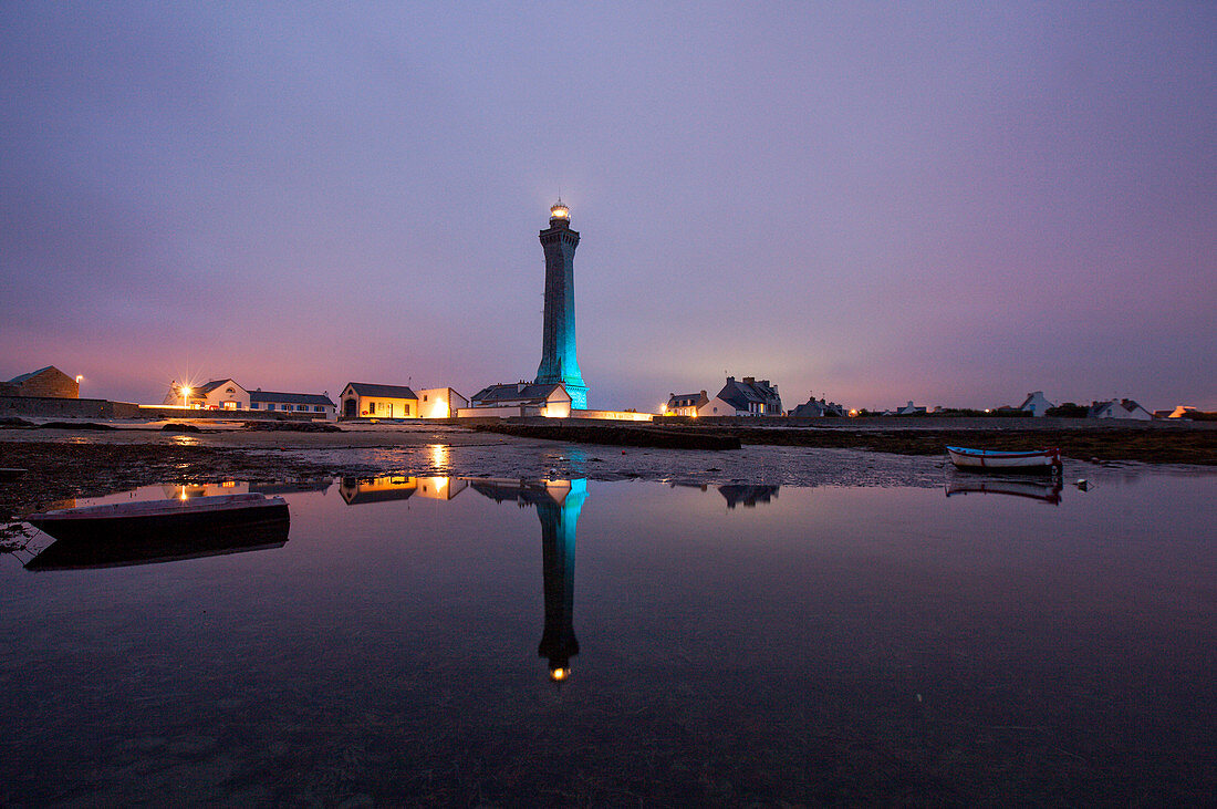 Reflection Of Lighthouse In Water At Penmarch, Finistere, Brittany, France