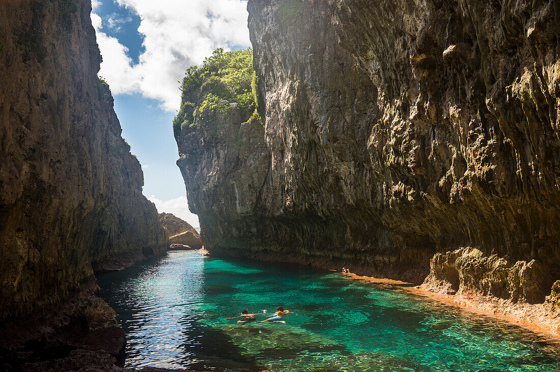 Crystal waters in the Matapa Chasm, Niue, South Pacific, Pacific