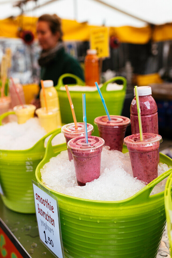 Selling Red Berry Smoothies on the Albert Cuyp Market, De Pijp, Amsterdam, Netherlands