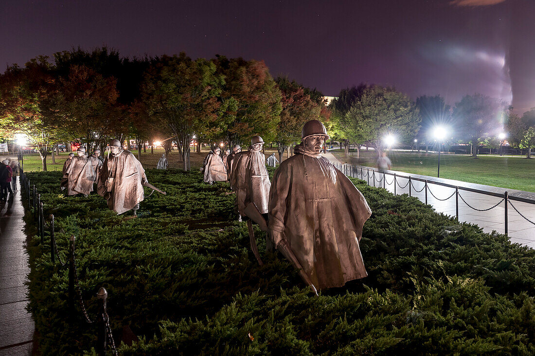 Statues At The Korean War Memorial During Night In Washington Dc