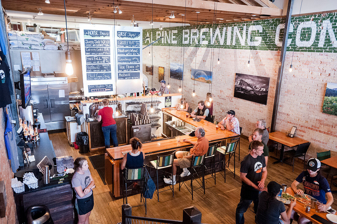People Enjoying High Alpine Brewery In Gunnison, Colorado, Usa