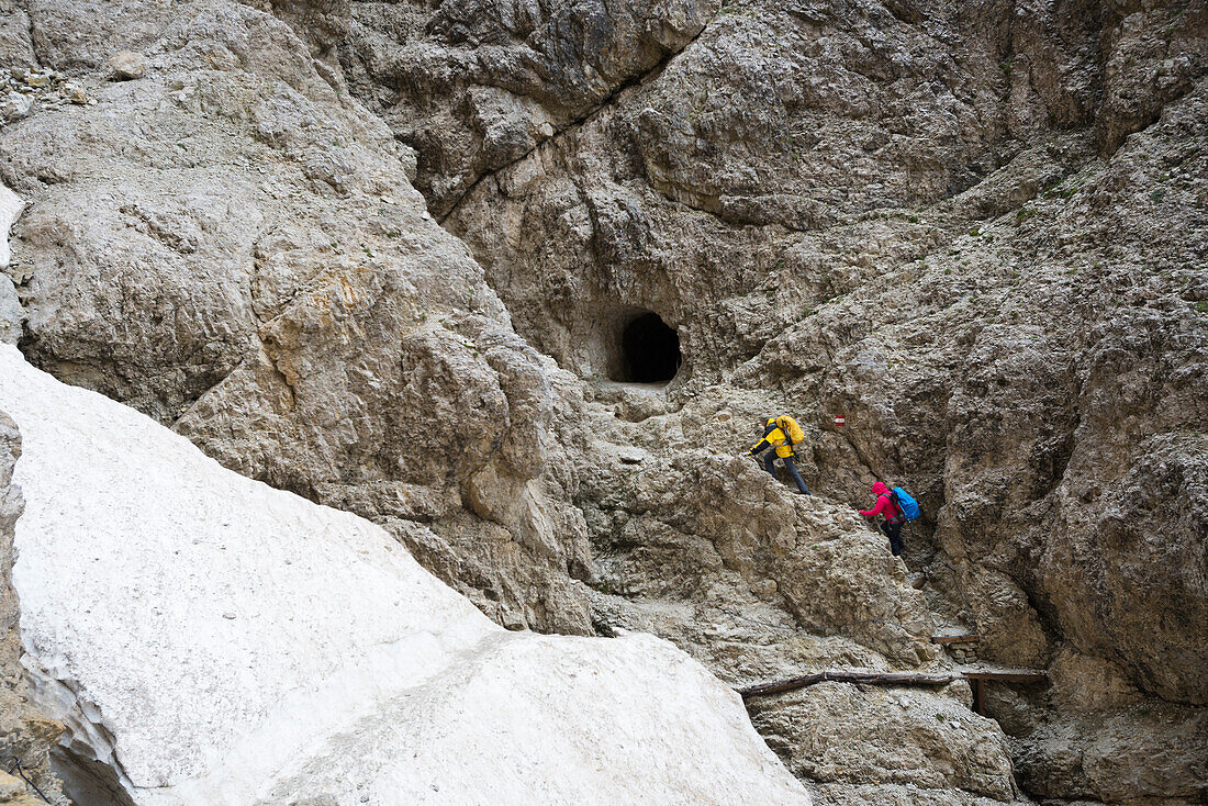 A Couple Hiking Through The Historical Trails And Tunnels At Lagazuoi