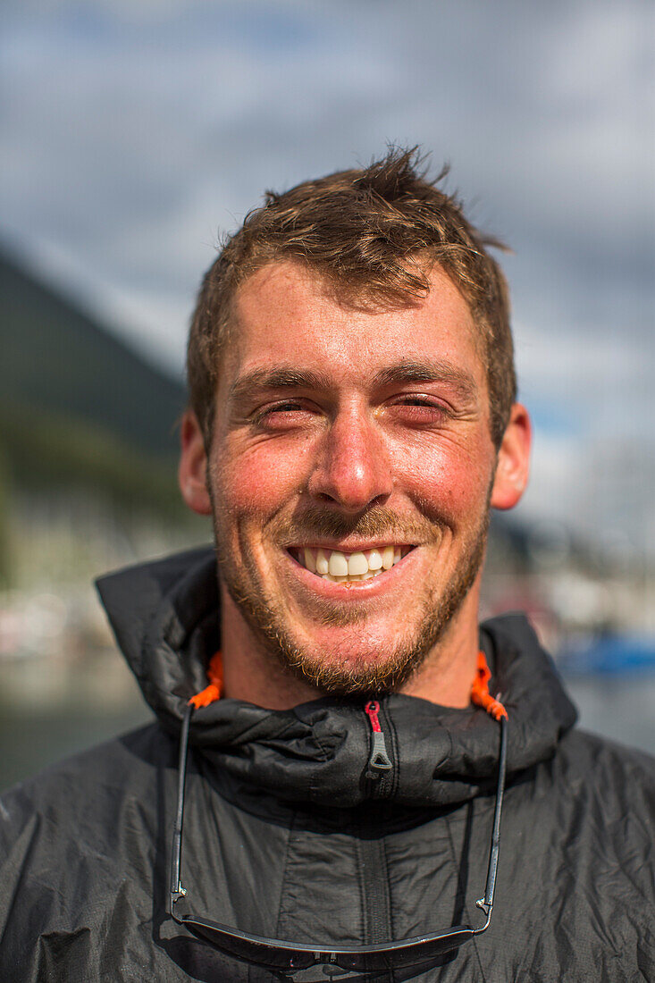 Portrait Of Smiling Member Of Team During The Race To Alaska