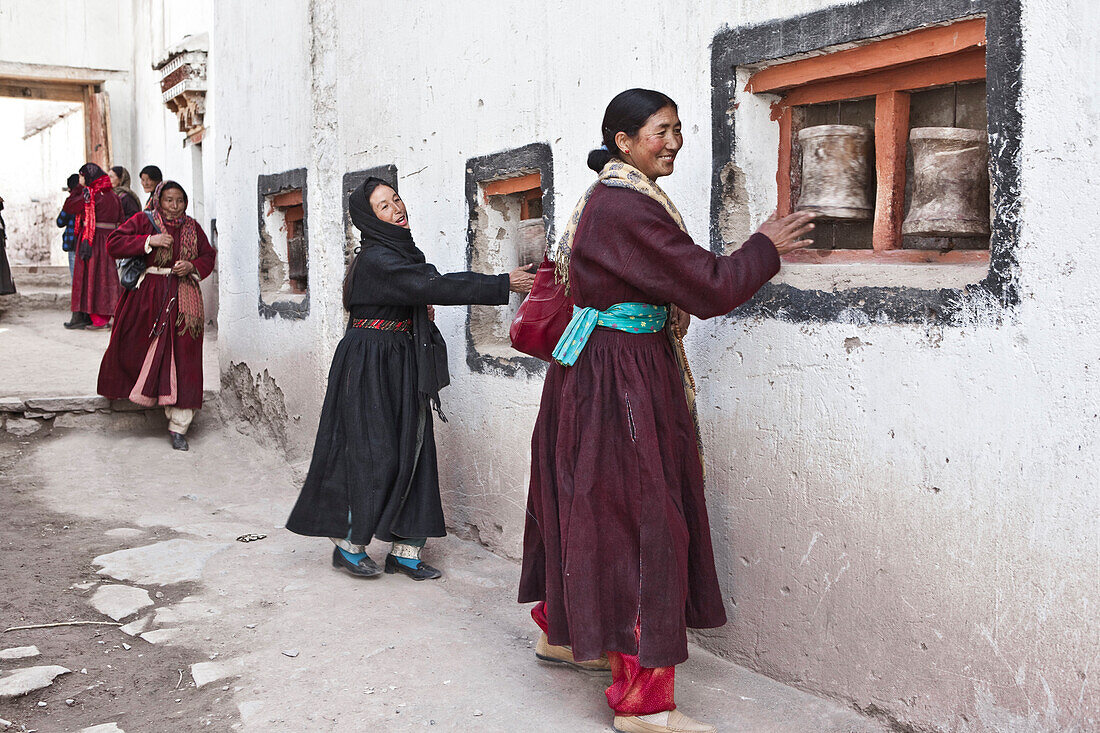 Ladakhi Women Turning Prayer Wheels At Hemis Monastery