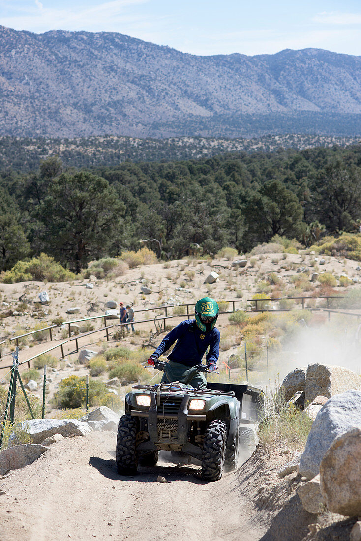 Volunteers take part in a cleanup event hosted by Outdoor Life, Yamaha and the Southern California Mountains Foundation at the Cactus Flat OHV Staging Area in the San Bernardino National Forest on Sat., Sept. 26, 2015.