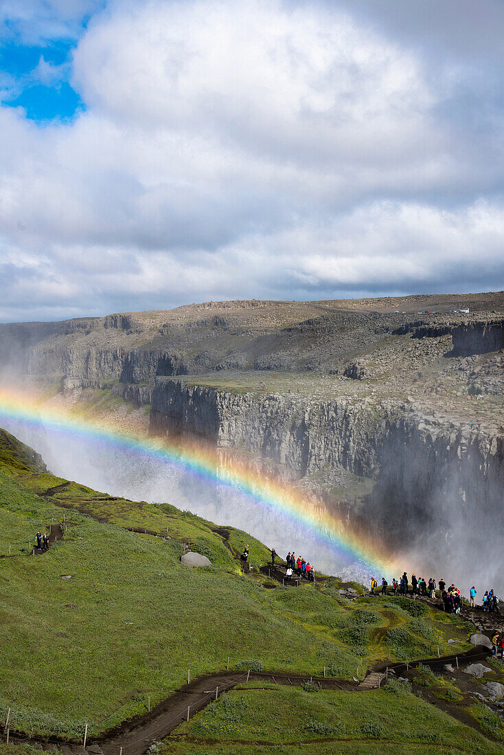 Dettifoss waterfall with rainbow at Iceland