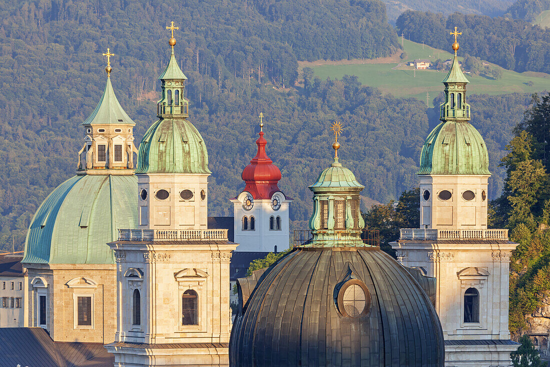 View of church towers of Kollegien church, Salzburg Cathedral and collegiate church Nonnenberg, Salzburg, Austria, Europe