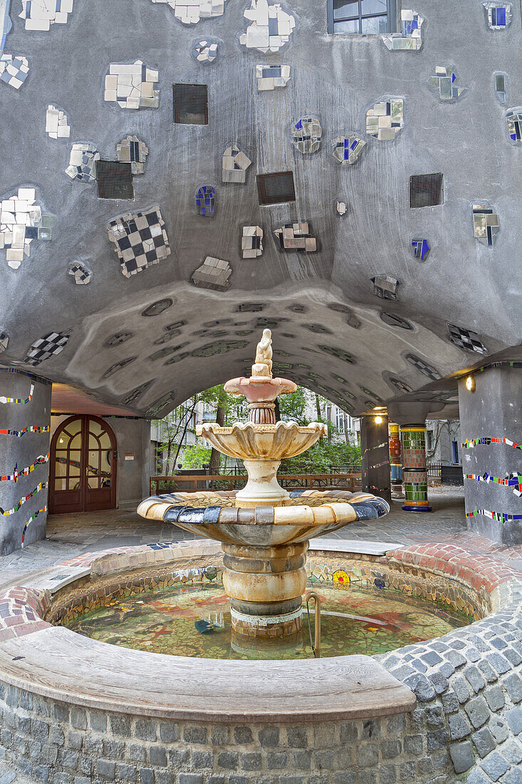 Fountain in front of the famous building Hundertwasserhaus of Friedensreich Hundertwasser and Josef Krawina in Vienna, Eastern Austria, Austria, Europe