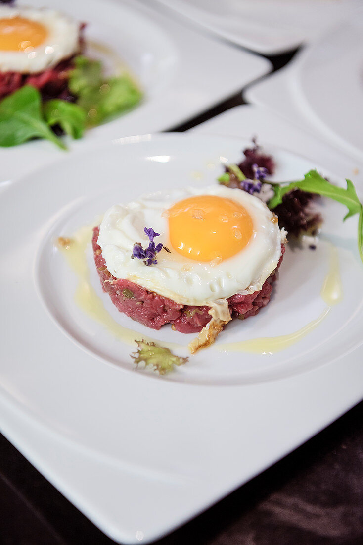 beef tatar with fried egg, cooking course at Swabian Alb, Baden-Wuerttemberg, Germany