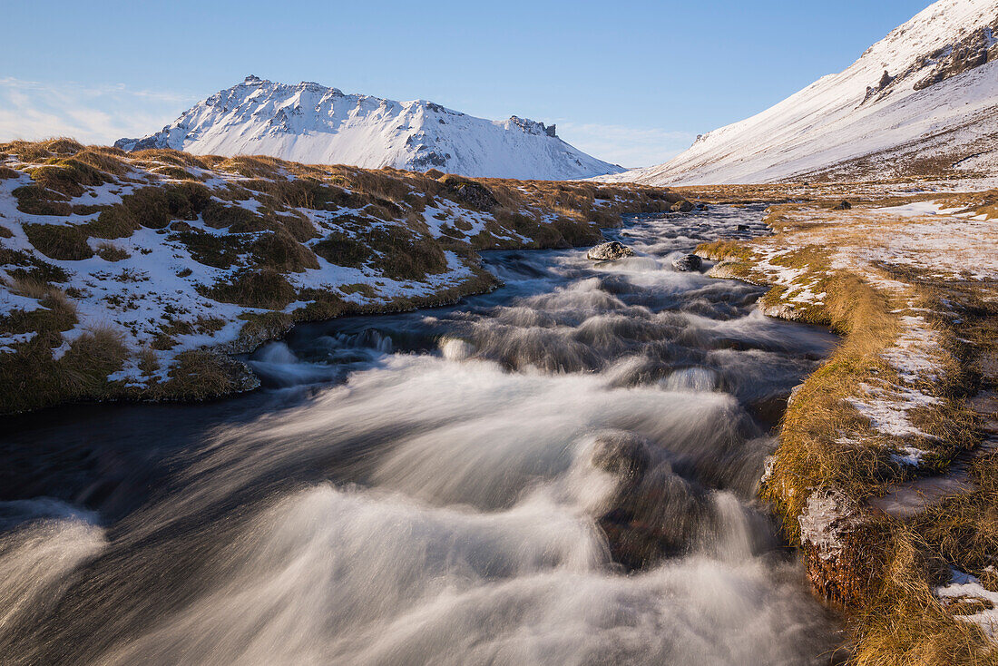Glacial river and snow-capped mountains, Snaefellsnes, Iceland, Polar Regions