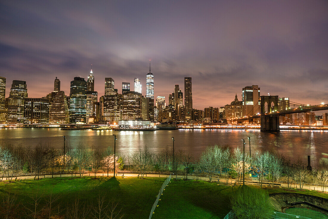 Manhattan skyline and Brooklyn Bridge, before sunrise, New York City, United States of America, North America
