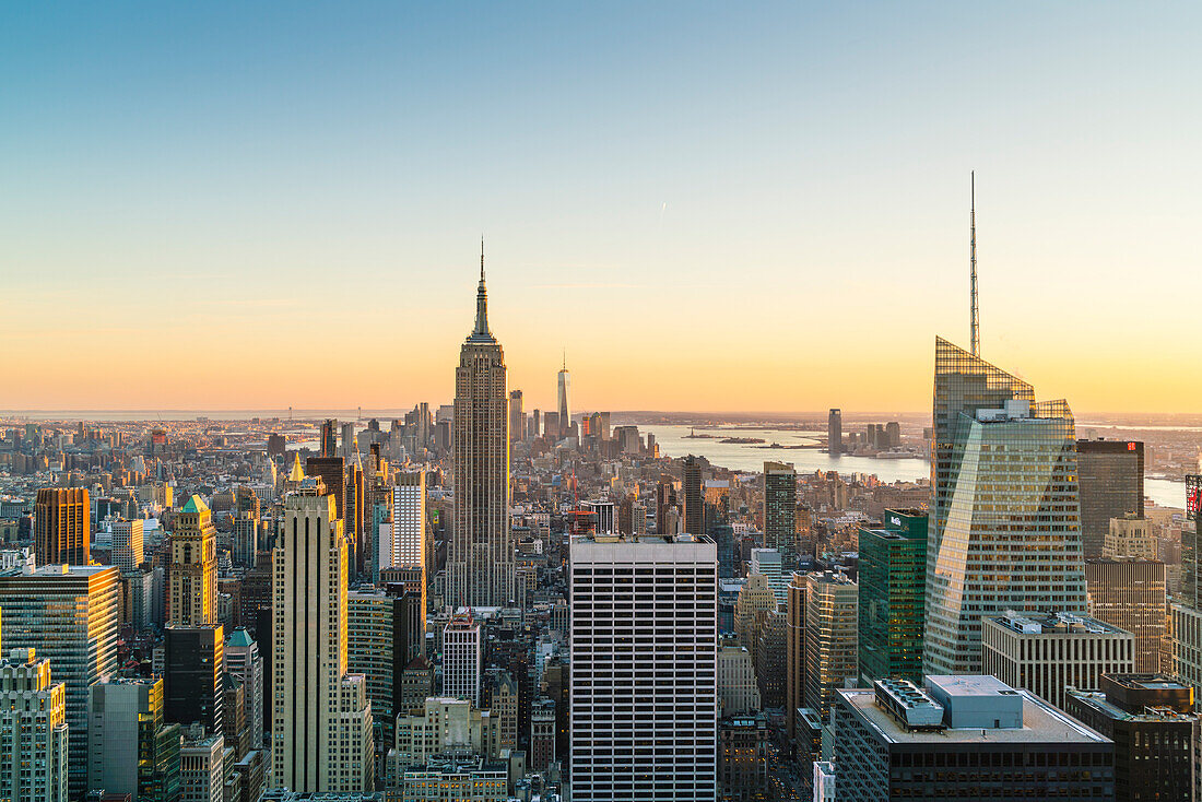 Manhattan skyline and Empire State Building, sunset, New York City, United States of America, North America