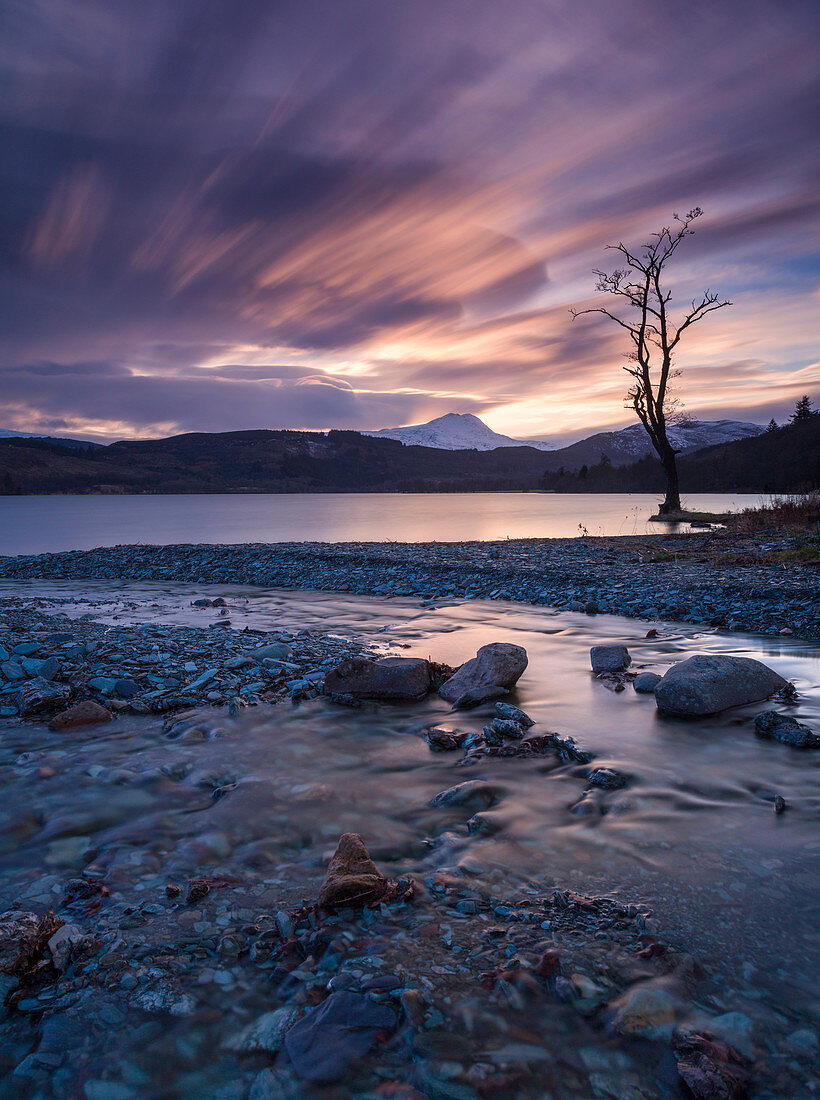 Sun setting over Ben Lomond and Loch Ard near Aberfoyle in the Lomond Trossachs National Park, Stirling, Scotland, United Kingdom, Europe