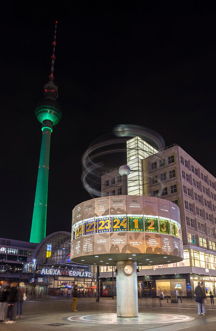 Urania Weltzeituhr clock and the Fernsehturm in Alexanderplataz, Berlin Mitte, Germany