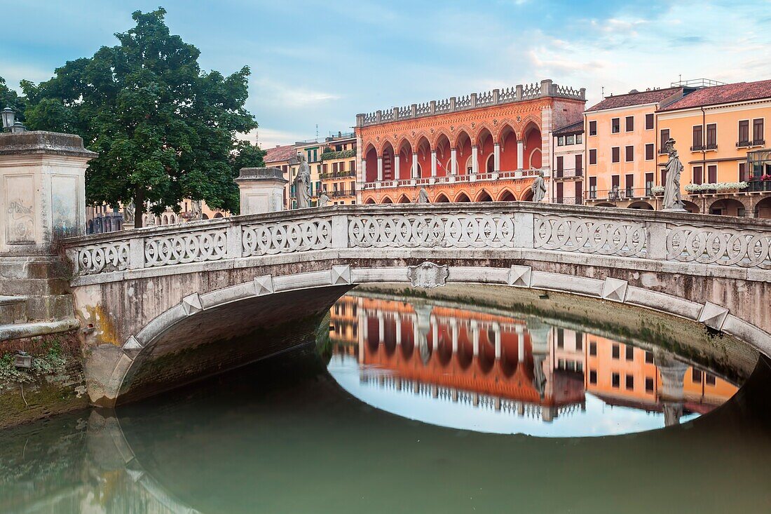 Prato della Valle, one of the symbols of Padua is a great elliptical square characterized by a green island in the center, called Memmia Island, surrounded by a canal, Prato della Valle, the Loggia Amulea, Padua