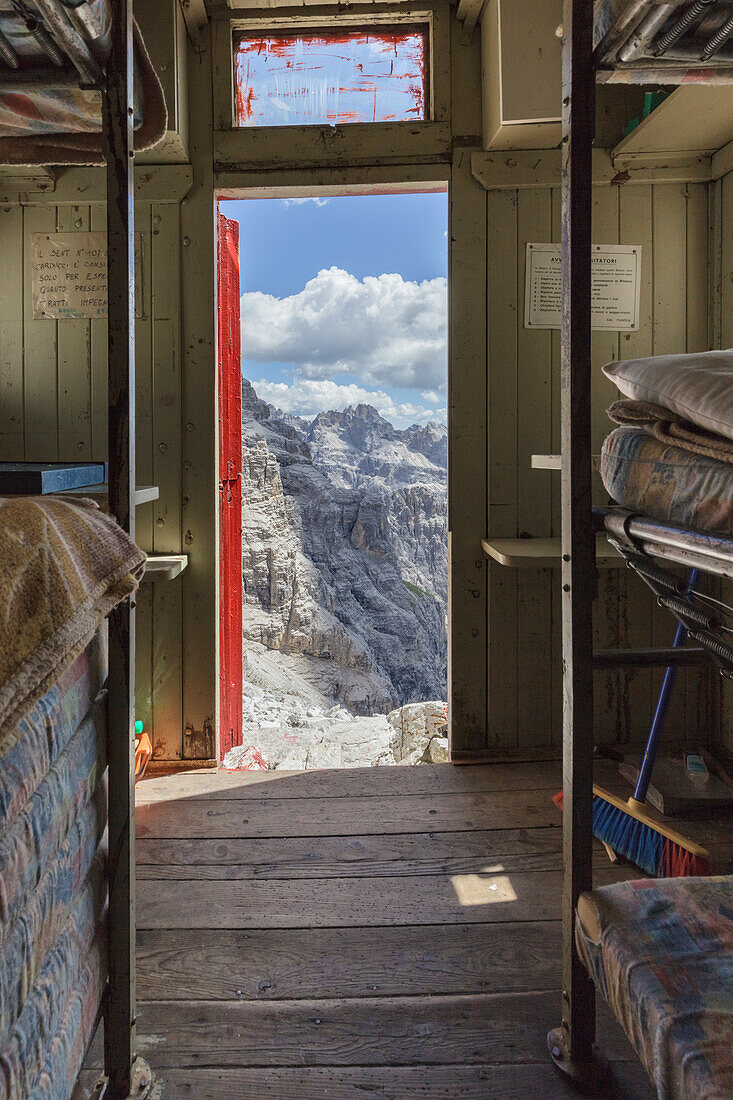 'Europe, Italy, Veneto, Belluno, View from inside the bivouac ''A, T, De Toni'' to the fork de l'Agnel, Croda dei Toni, Dolomites'