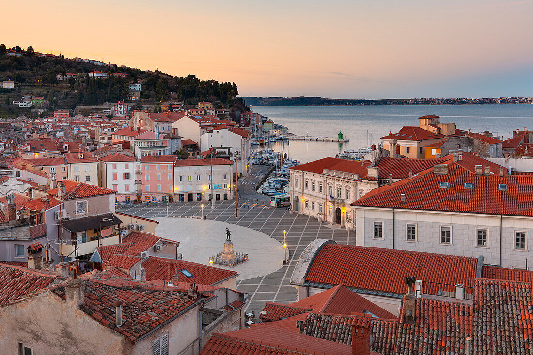 Europe, Slovenia, Istria, Piran, View on Tartini Square and the city center at dusk