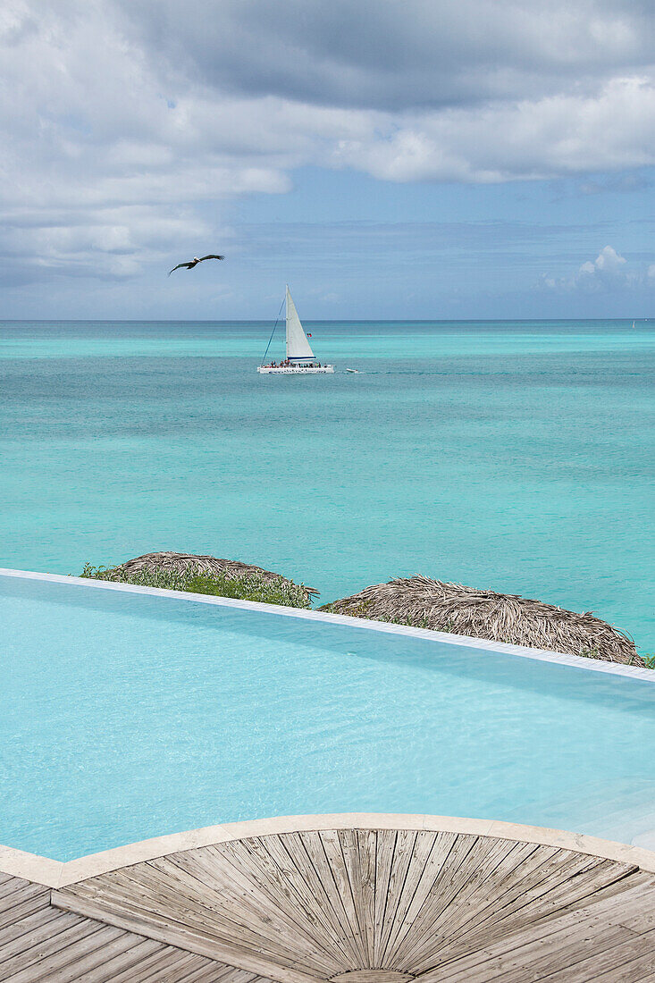 Pool in front of the turquoise waters of Caribbean Sea Ffryes Beach Sheer Rocks Antigua and Barbuda Leeward Island West Indies