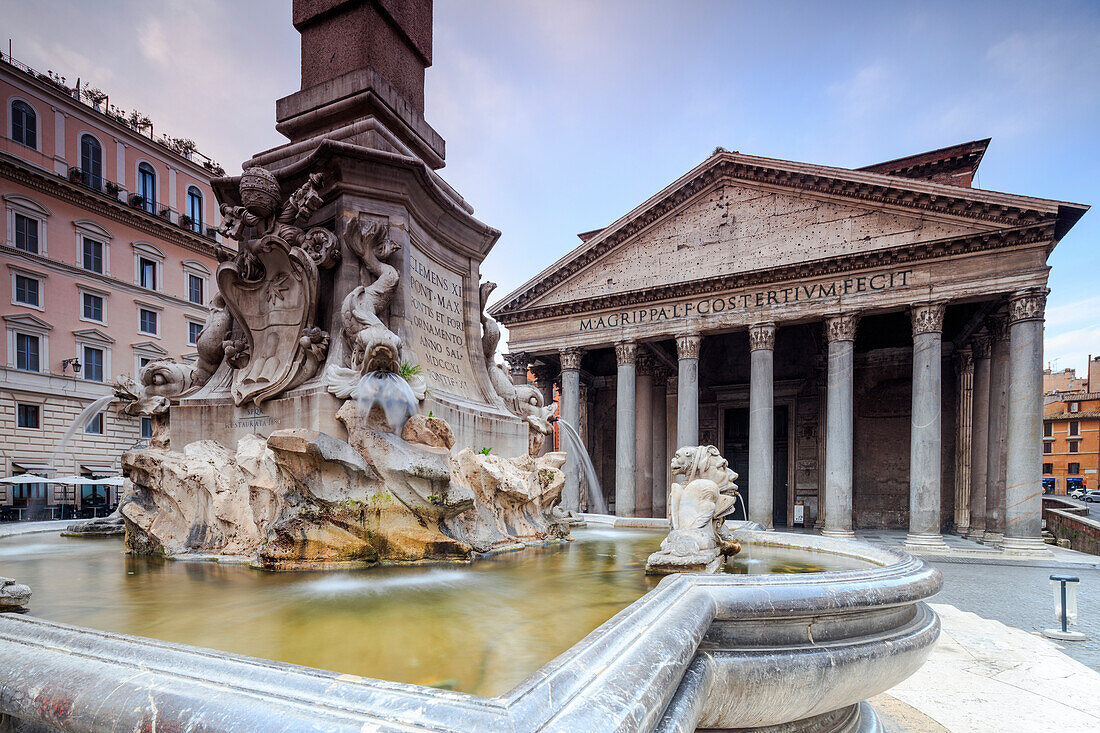 View of old Pantheon a circular building with a portico of granite Corinthian columns and its fountains Rome Lazio Italy Europe