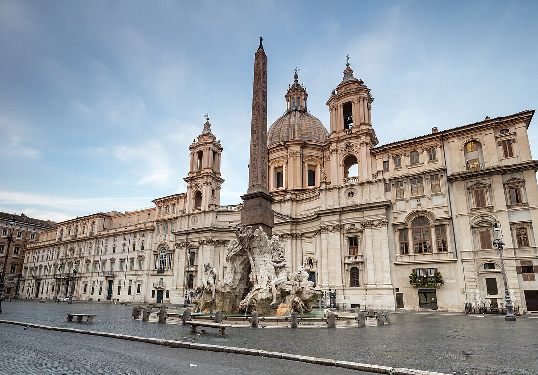 View of Piazza Navona with Fountain of the Four Rivers and the Egyptian obelisk in the middle Rome Lazio Italy Europe