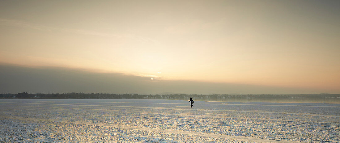 Frozen Lake Starnberg at sunset, Muensing, upper Bavaria, Bavaria, Germany