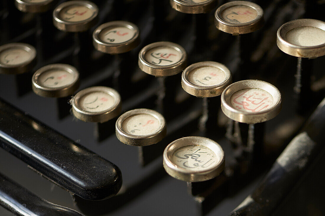historic typewriter with arabic characters, nostalgic