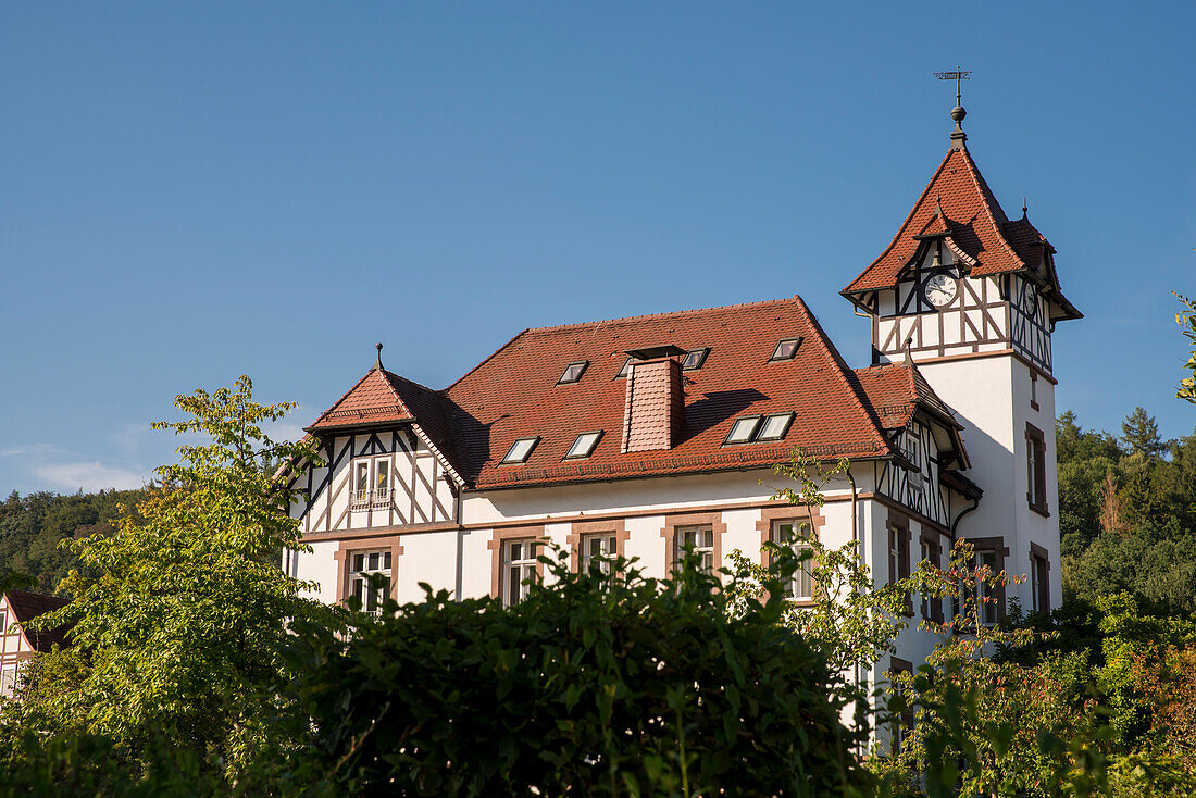 Historic half-timbered house at the Saline with clock tower, Bad Karlshafen, Hesse, Germany, Europe