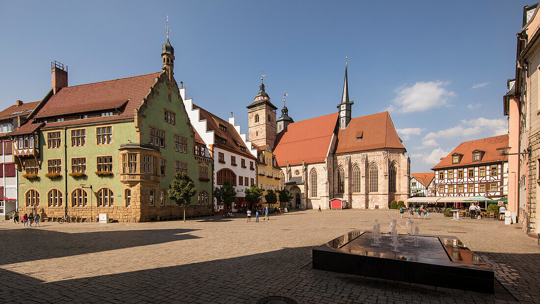 Altmarkt at the town church Sankt Georg, rear view from the market side with historic half-timbered houses and historic stone houses, Schmalkalden, Thuringia, Germany, Europe